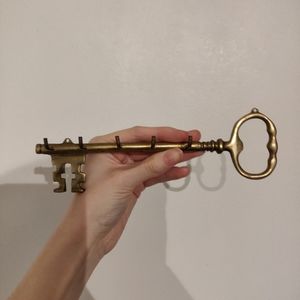 Gold key shaped key hook